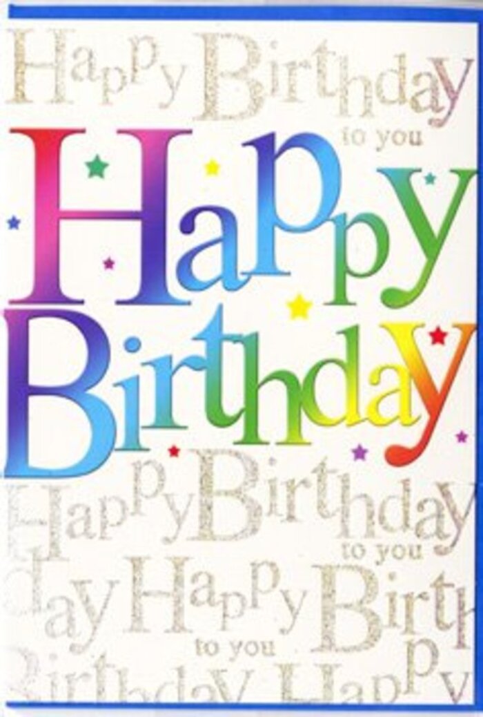 The birthday card in this image radiates upbeat energy, as if it were designed to be the first burst of colour at a Kennington birthday gathering. Dominating the front, the phrase Happy Birthday is written in broad, smoothly curved letters that transition seamlessly through a full rainbow spectrum. Each letter carries its own blend of pigments-punchy crimson and magenta melting into warm tangerine and mango yellow, then cooling into fresh greens, aquas, and twilight blues-creating a fluid ombré effect that feels almost like watercolour ink layered with expert care. The edges of the letters are crisp and clear, yet the interior shading is soft and cloudlike, giving an impression of depth and movement similar to the shifting petals in a mixed bouquet. Behind this bright statement, the entire background is covered with delicate golden writing, repeating Happy Birthday to you in elegant, looping script that runs diagonally across the card. The letters appear to be printed in a light-reflective gold, with a subtle glitter or foil finish that catches the light the way evening sun skims the railings and railings around Kennington Park. This shimmering backdrop is gentle and slightly blurred from a distance, adding texture without distracting from the central message. Small, colourful sparkles and dot-like accents sprinkle between the lines of script, reminiscent of confetti floating down after a toast or the tiny reflections you might see on glass vases in a Kennington Flowers display. The design feels celebratory yet carefully composed-a card that would slip beautifully alongside a hand-tied birthday bouquet, bringing the same joyful spirit into a home, office, or cosy flat near Elephant & Castle.